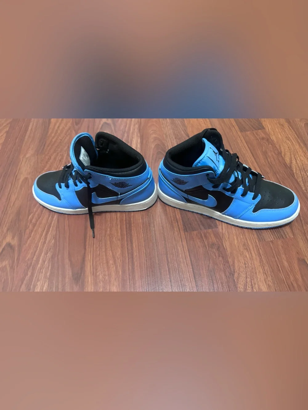 Jordan Youths Light Blue and Black High-Top Sneakers